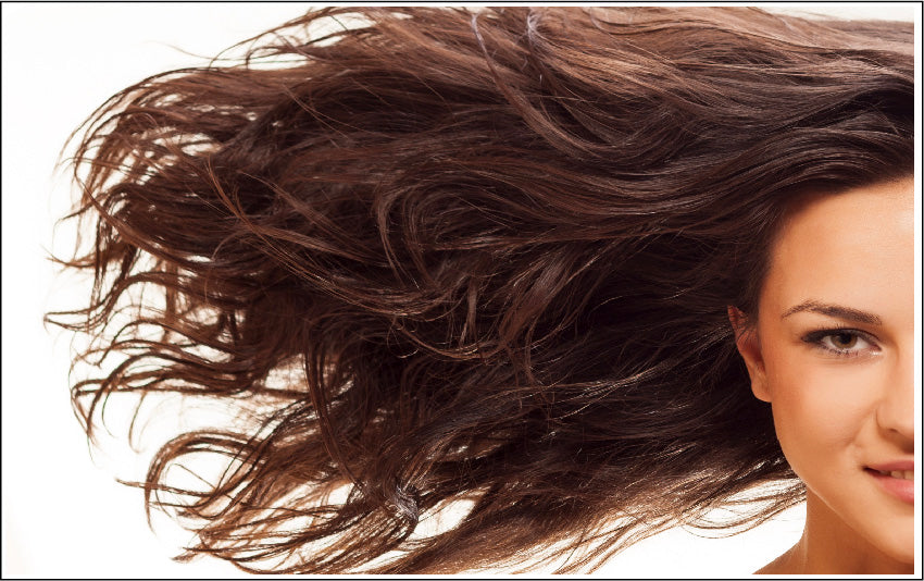 Beautiful woman with lovely hair for Luminance Skincare Shampoo