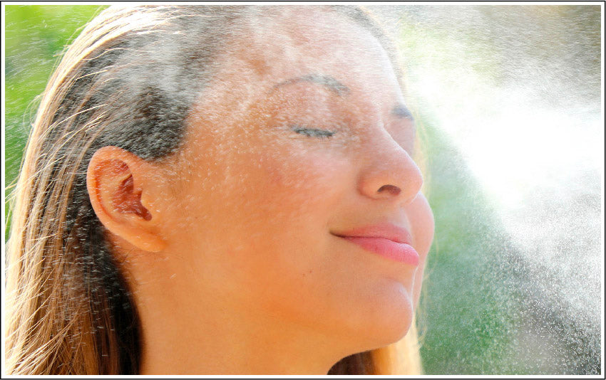 Image of woman toning her face with Luminance Floral Water Toner