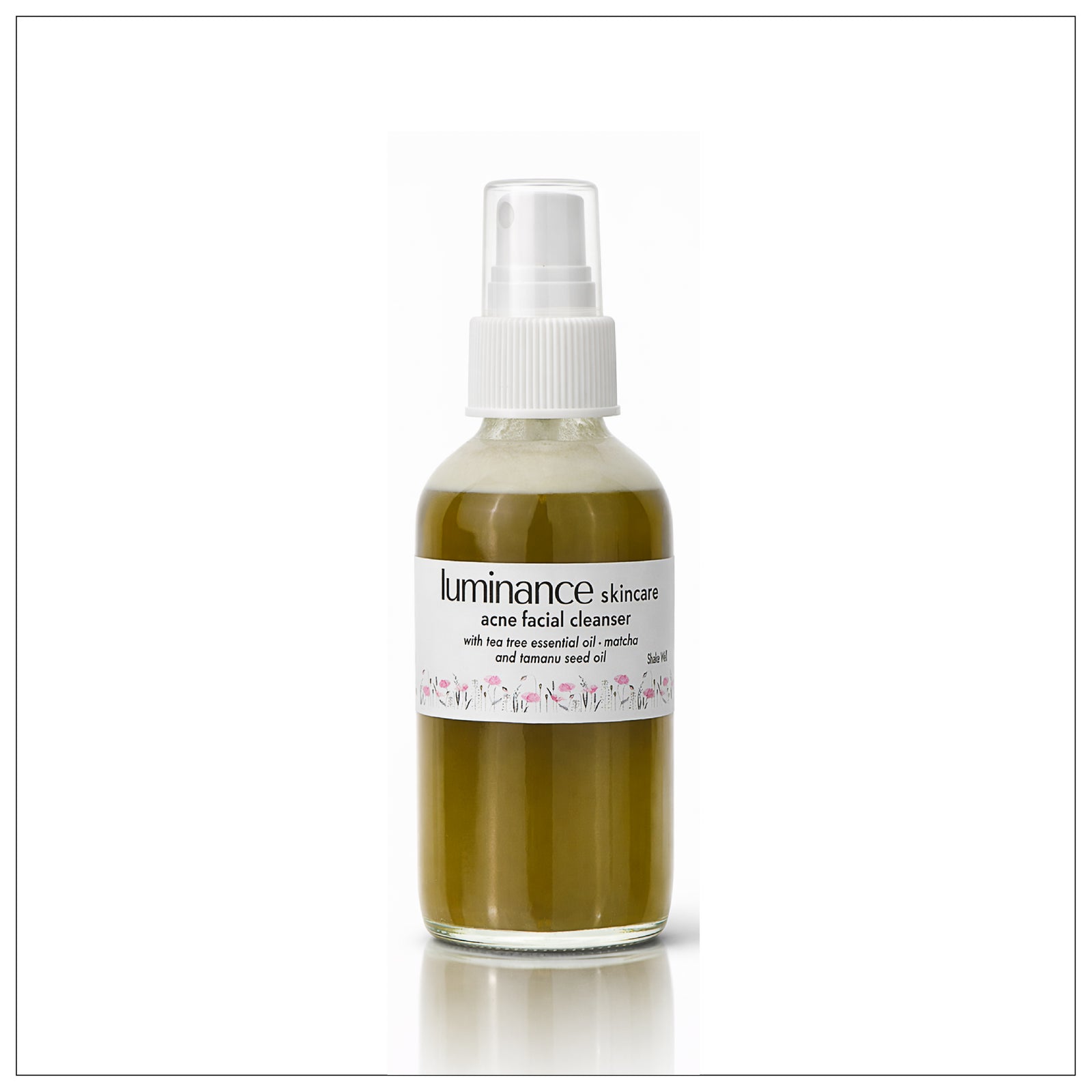 Bottle of Luminance skincare cleanser on a white background